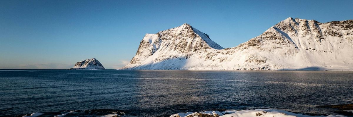 Vast arctic horizon with clear blue light